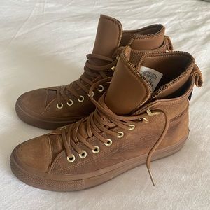 Converse leather high top sneakers
